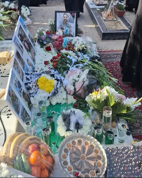An image of slain protester Alireza Mousavi Noor’s grave