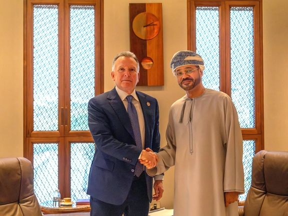 US Special Envoy to the Middle East Steve Witkoff shakes hands with Omani Foreign Minister Sayyid Badr Albusaidi in Muscat, Oman, April 12, 2025.