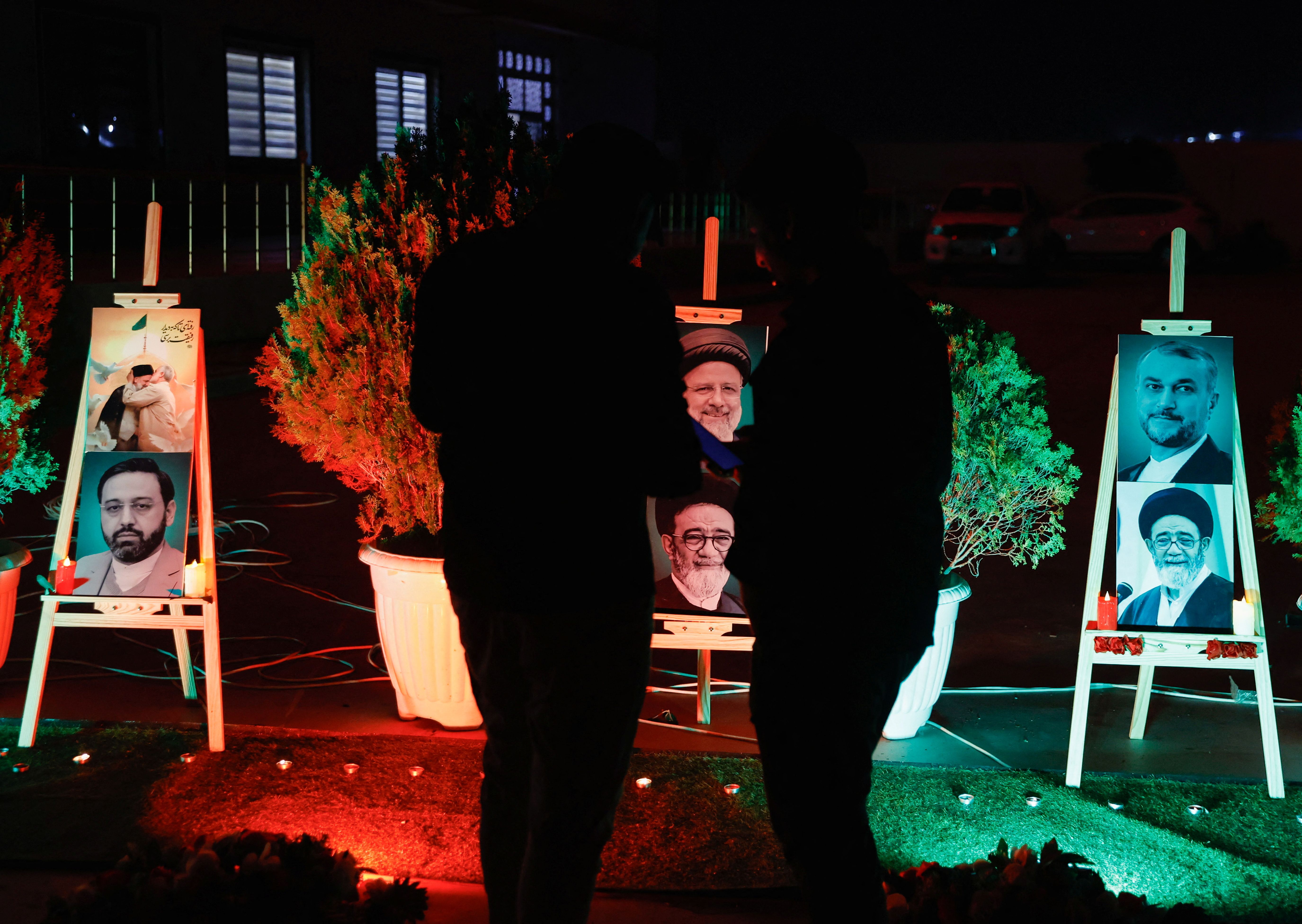 Men stand as they offer condolences over the deaths of Iran's President Ebrahim Raisi and others, at the representative office of Iran's Supreme Leader Ayatollah Ali Khamenei in Mosul, Iraq May 21, 2024. 