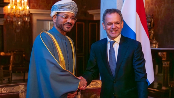 Dutch Foreign Minister Caspar Veldkamp (right) shakes hands with Omani Foreign Minister Badr al-Busaidi during a meeting in the Netherlands, April 15, 2025.