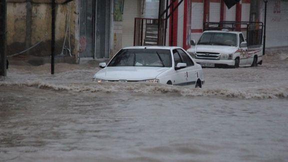 Flood waters surge in Iran's Fars Province on Sunday.
