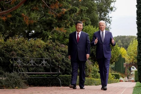 US President Joe Biden gives thumbs-up as he walks with Chinese President Xi Jinping at Filoli estate on the sidelines of the Asia-Pacific Economic Cooperation (APEC) summit, in Woodside, California, November 15, 2023.