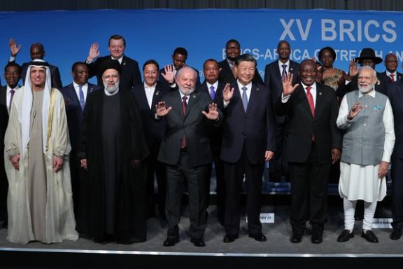 Participants of the BRICS summit pose for a group photo at the Sandton Convention Centre in Johannesburg on August 24, 2023