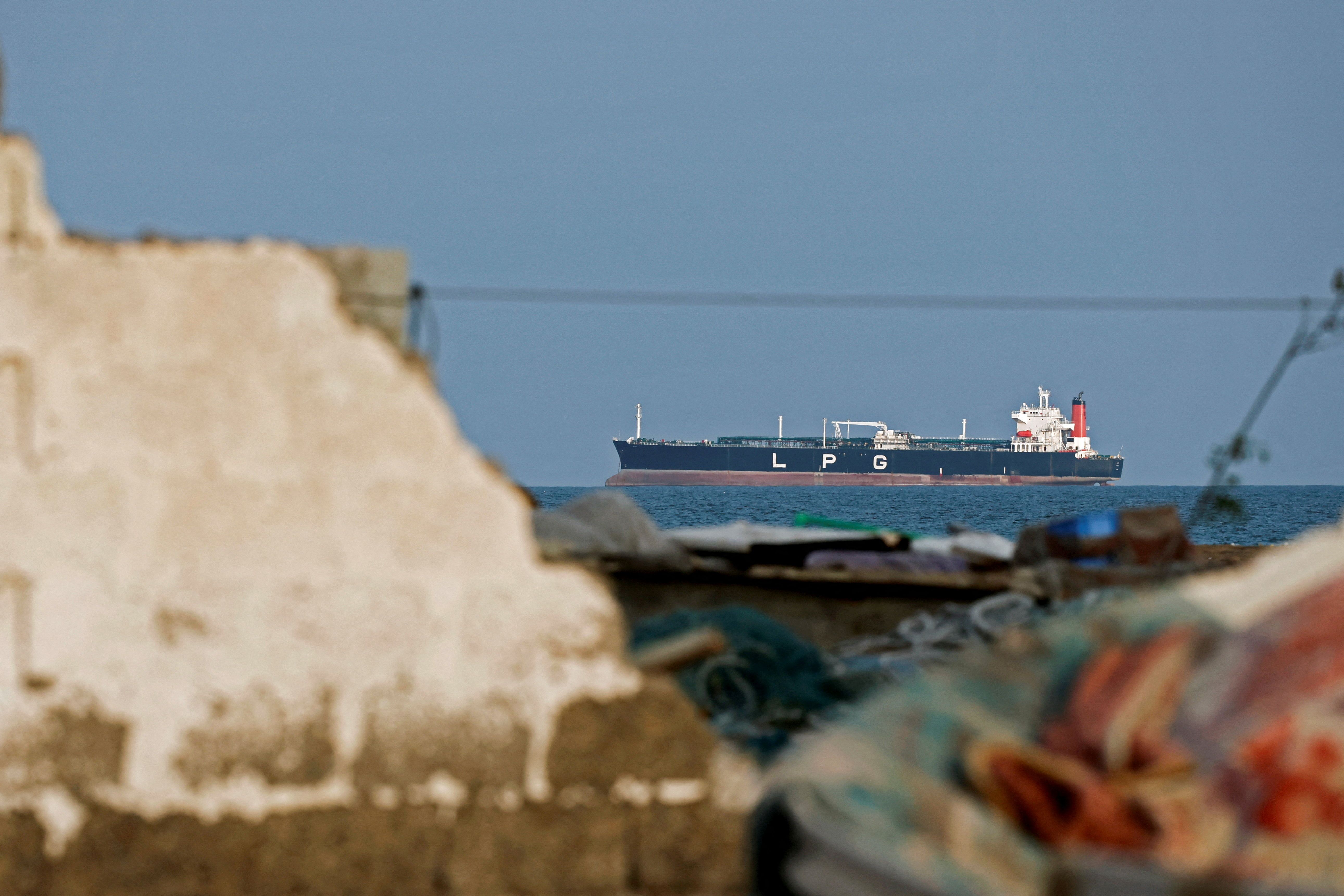 A LPG gas tanker sits anchored as the traffic is down in the Strait of Hormuz, amid the US-Israeli conflict with Iran, in Shinas, Oman, March 11, 2026.