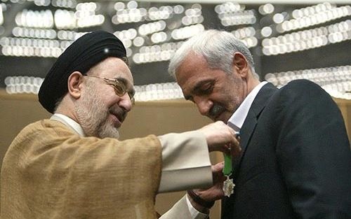 Former President of Iran’s Football Federation Mohammad Dadkan receiving a medal from former president Mohammad Khatami (undated)