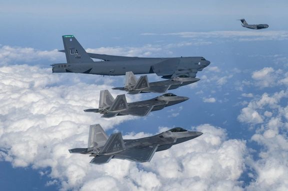 A U.S. Air Force B-52 strategic bomber, C-17 and F-22s take part in a joint drill with South Korea's Air Force, in South Korea, December 20, 2022. T