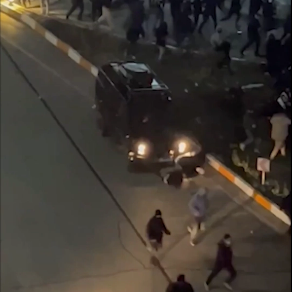 Canada condemns Iran after video shows armored car running over protesters