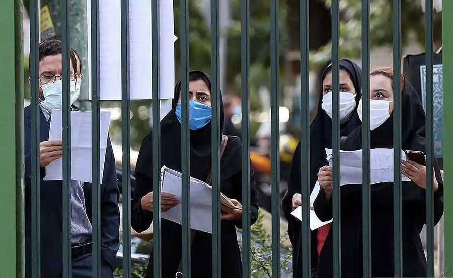 Iranian students checking lists of those admitted to university