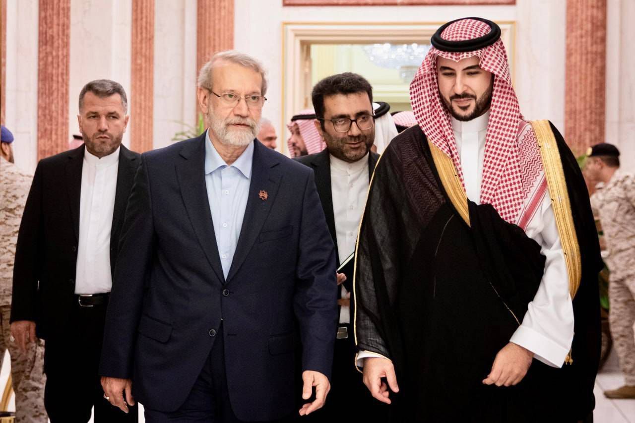 Saudi defense minister Khalid Bin Salman (right) meets Iran's top security official Ali Larijani