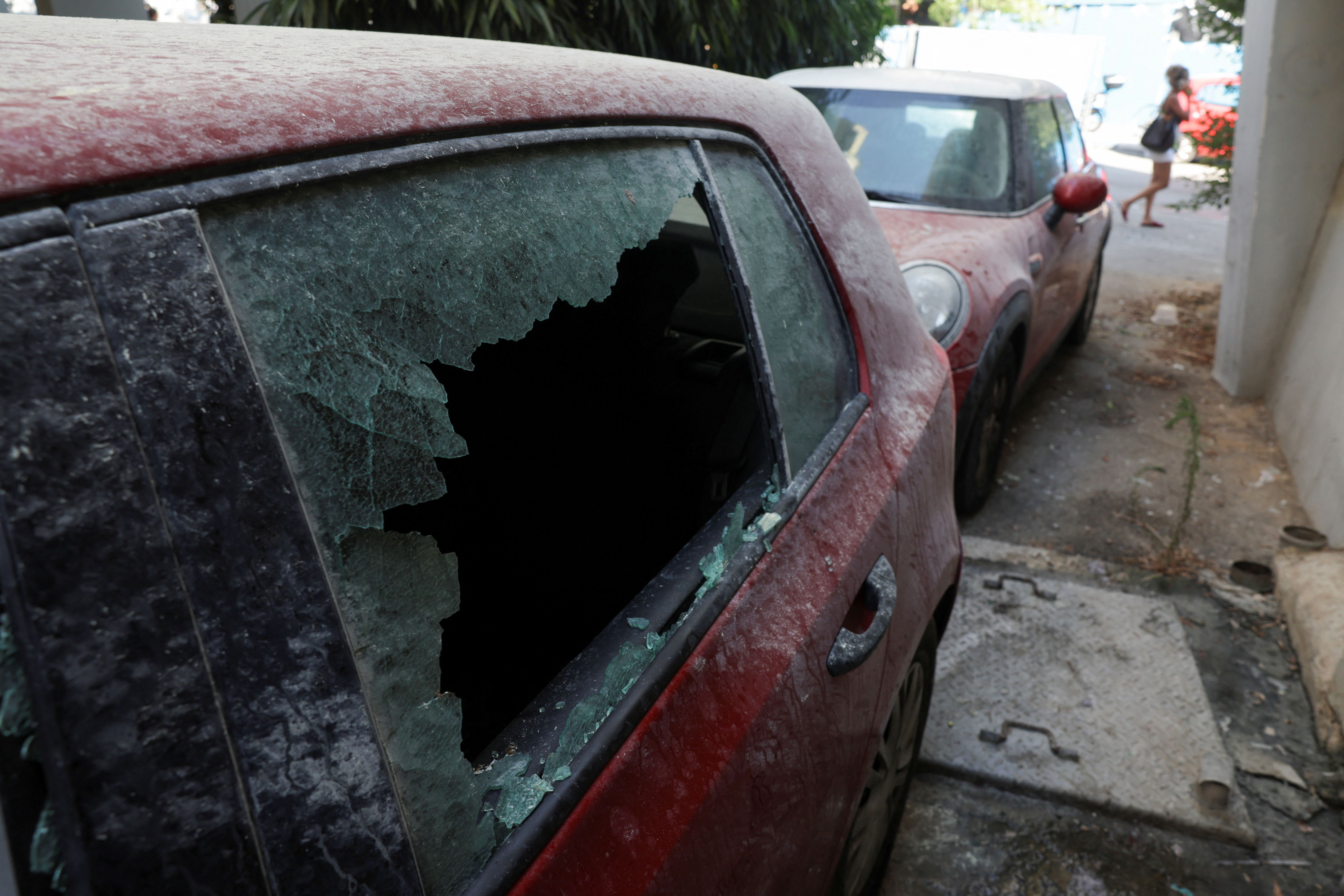 The damaged window of a car is pictured near the site of an explosion, amid the Israel-Hamas conflict in Tel Aviv, Israel July 19, 2024. 
