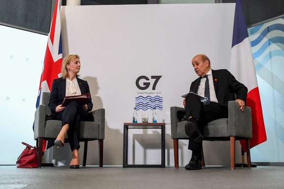 British and French foreign ministers at the G7 meeting on December 10.