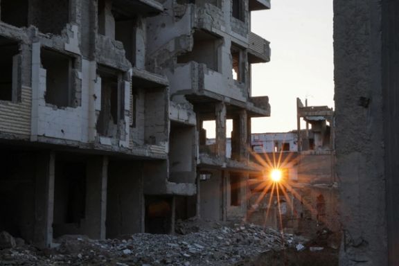 نمایی از ویرانیهای به جا مانده از درگیریها در حومه دمشق، ۱۴ دی