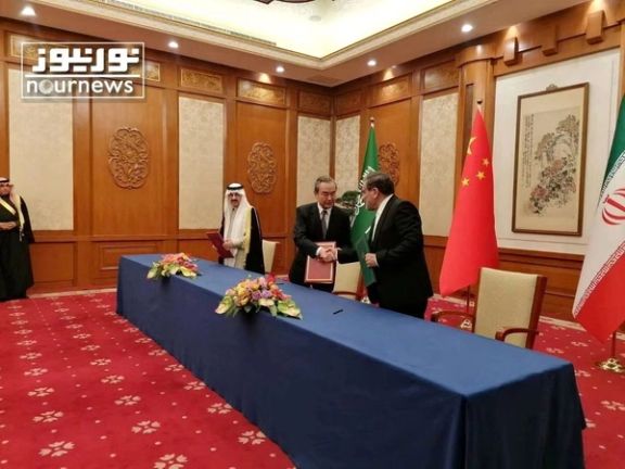 Iranian Rear Admiral Ali Shamkhani, the secretary of the Supreme National Security Council meets the Saudi Minister of State and National Security Adviser Musaed bin Mohammed Al-Aiban, and China's Director of the Office of the Central Foreign Affairs Commission Wang Yi, in Beijing, China, March 10, 2023.