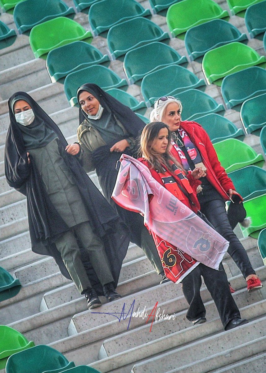 Hijab enforcers and female fans at Tehran's Azadi Stadium