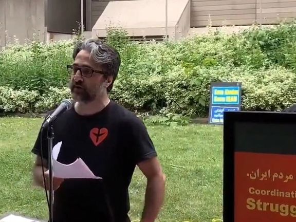 Hamed Esmailioun, who is the spokesman for the victims of IRGC’s downing of Ukrainian Airlines Flight PS752, delivers a speech during a gathering of Iranian expatriates in Toronto on June 5, 2022, in solidarity with the popular protests in the southwestern Iranian city of Abadan.