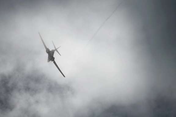A US Air Force B-1B Lancer bomber flies through a cloud over Andersen Air Force Base, Guam May 19, 2020.