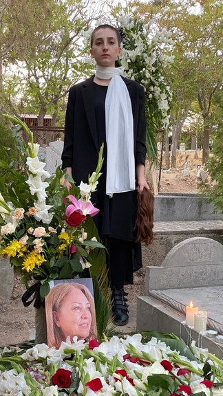 Roya Piraei at her mother's grave.