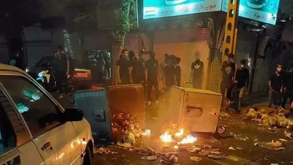 Young protesters in the streets of Iran in October