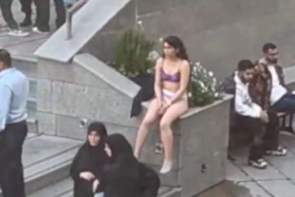 Iranian student strips in protest against assault by hijab enforcers