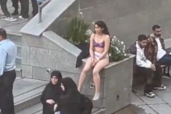 Iranian student strips in protest against assault by hijab enforcers