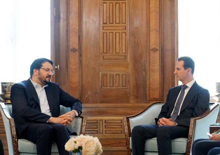Presidential candidate Mehrdad Bazrpash seen with Syrian President Bashar al-Assad in Damascus.