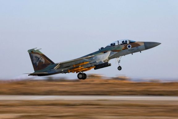 Israeli Air Force F-15 flies during an aerial demonstration at a graduation ceremony for Israeli Air Force pilots at Hatzerim Airbase in southern Israel, June 23, 2022