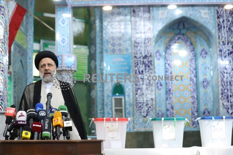 Ebrahim Raisi casting his ballot in June 2021