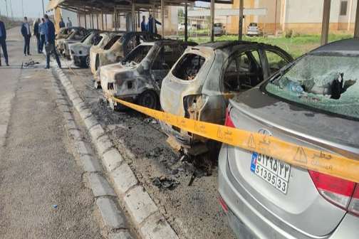 Cars destroyed in attack on petrochemical company in southern Iran.