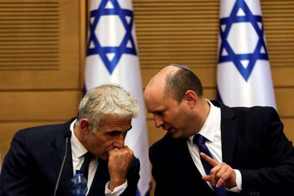 Israeli Prime Minister Naftali Bennett and his foreign minister in a meeting. Undated