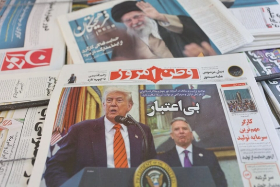 An Iranian newspaper with a cover photo of US President Donald Trump and US Middle East envoy Steve Witkoff, is seen in Tehran, Iran, May 11, 2025.