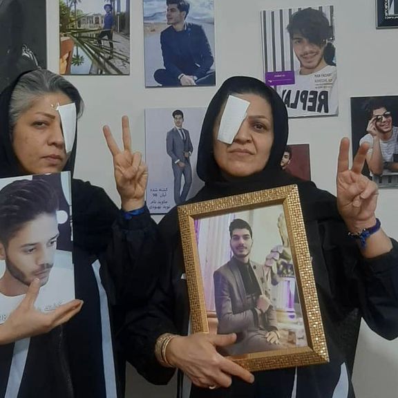 People symbolically put a patch on one ye to highlight injuries protesters suffered in Esfahan protests.
