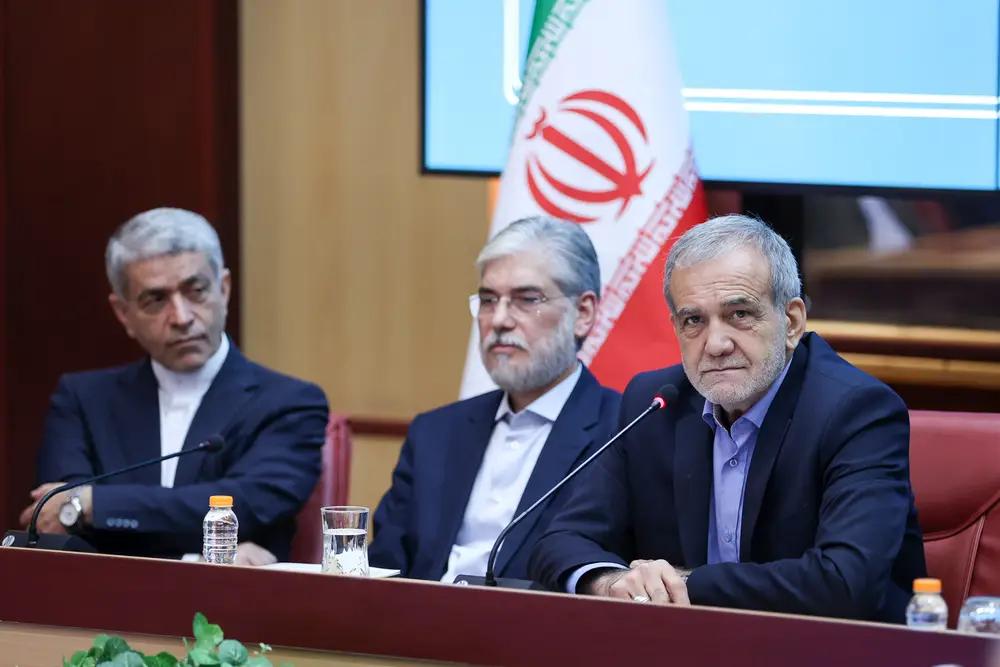 During the introduction session of Iran's new Minister of Science (center) on August 29, President Masoud Pezeshkian (right) addresses the attendees
