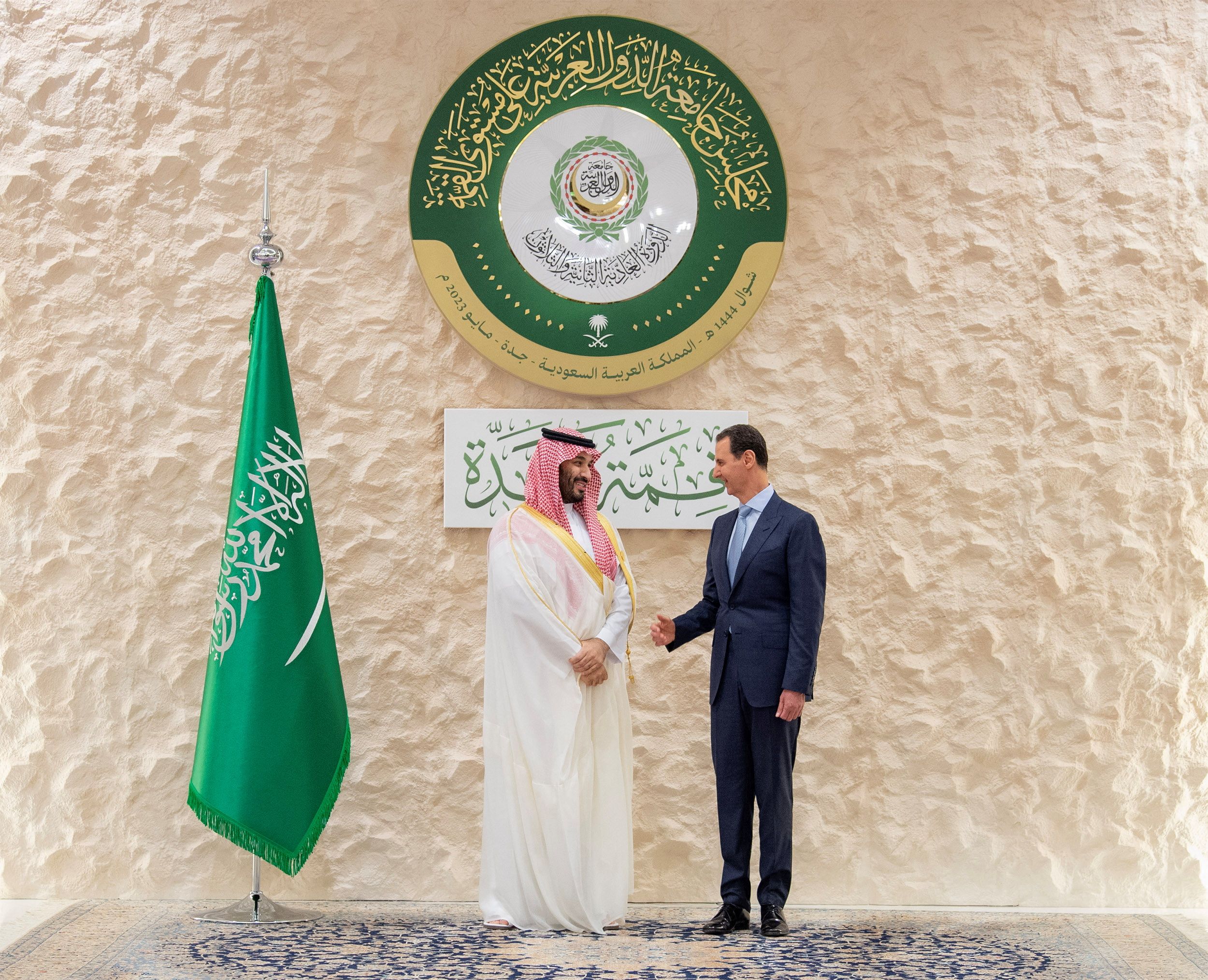 Saudi Arabia's Crown Prince Mohammed bin Salman shakes hands with Syria's President Bashar al-Assad ahead of the Arab League Summit in Jeddah, Saudi Arabia, May 19, 2023.