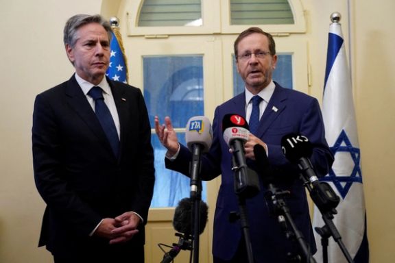 US Secretary of State Antony Blinken and Israel's President Isaac Herzog make statements to the media inside The Kirya, which houses the Israeli Ministry of Defense, in Tel Aviv, Israel, Thursday Oct. 12, 2023.