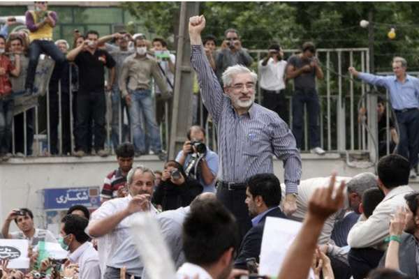 Former Iran PM Turned Opposition Has Believers And Critics