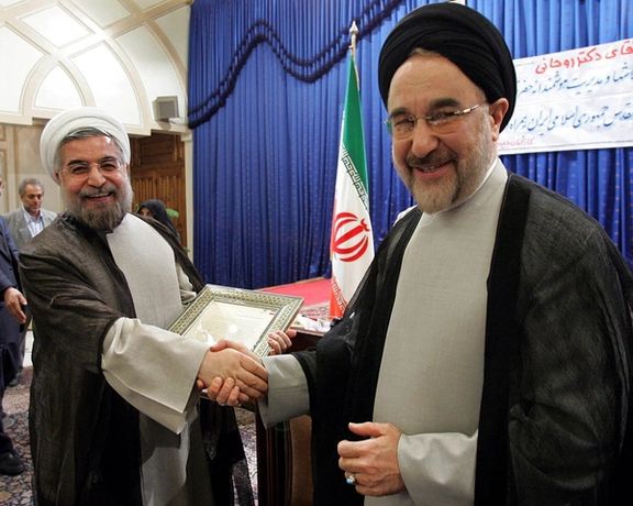 Former presidents Mohammad Khatami (right) and Hassan Rouhani (undated)