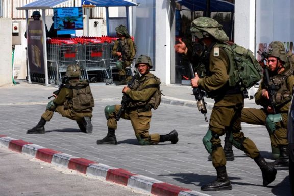 Israeli soldiers work to secure residential areas following a mass-infiltration by Hamas gunmen from the Gaza Strip, in Sderot, southern Israel, October 7.