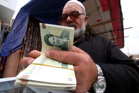 Iran's rial hits new low after minister acknowledges slide