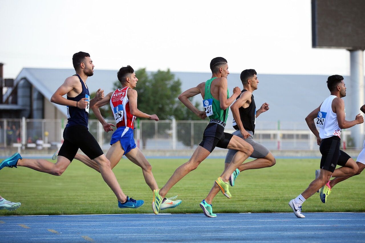 File photo of Iranian men competing in a running race in southern Iran