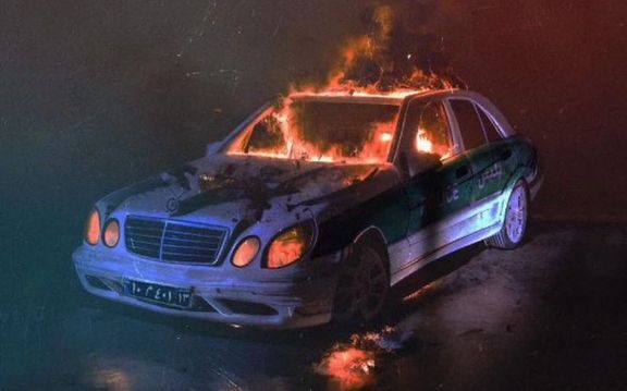 An artwork created in support of protests in the last week of the Iranian year (Charshanbeh Souri) showing a police car on fire (March 2023)