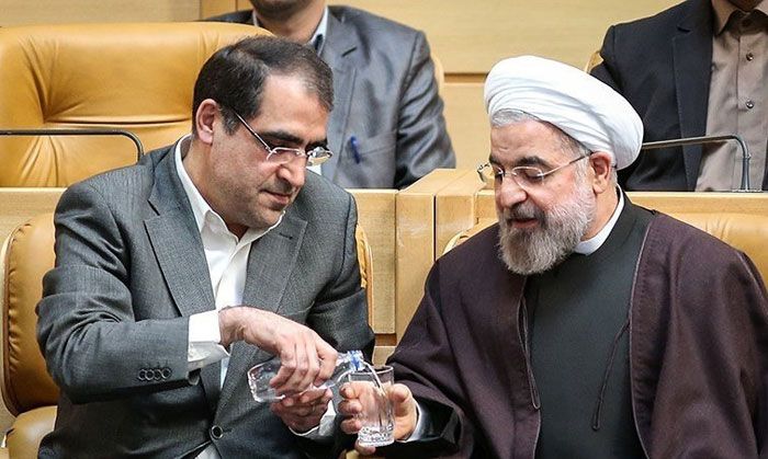 Former Health Minister Hassan Ghazizadeh Hashemi (left) and former President Hassan Rouhani 