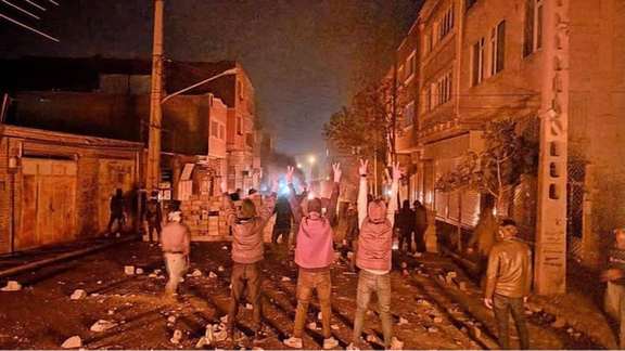 People block a street during protests