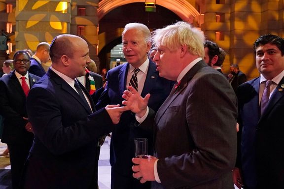 Israel's PM Naftali Bennett, US President Joe Biden and Britain's PM Boris Johnson chat as they attend an evening reception, in Glasgow, Scotland, November 1, 2021.