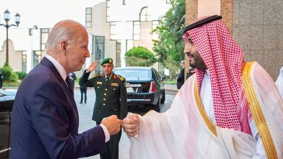 President Joe Biden fist-pumping with Saudi Arabia's Crown Prince Mohammed bin Salman. July 15, 2022