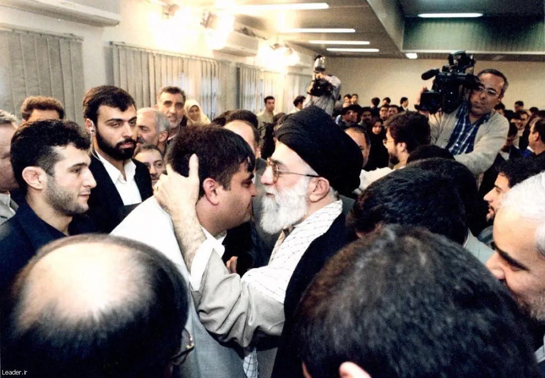 Iran’s ruler Ali Khamenei kissing weightlifting champion Hossein Rezazadeh (undated)