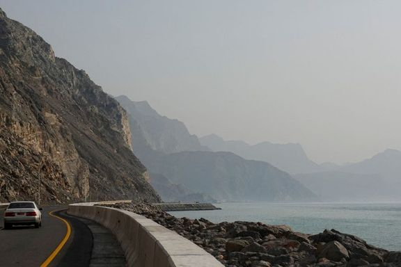 A car rides along the coast of Musandam overlooking the Strait of Hormuz amid the US-Israeli conflict with Iran, Oman, March 2, 2026.