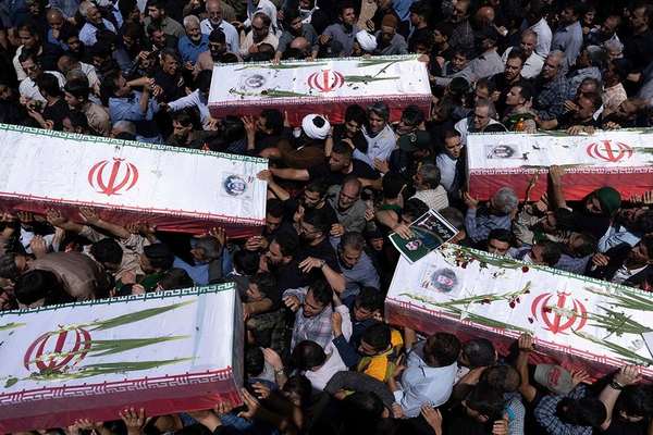 Israel attacks Iran state media, orders evacuations and moots regime change