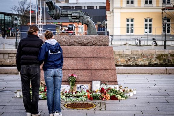 Flowers, lights and portraits sit at the memorial site for Alexei Navalny at Carl Fredrik Reutersward's sculpture 'Non-Violence', at Anna Lindhs Place, in Malmo, Sweden February 20, 2024.