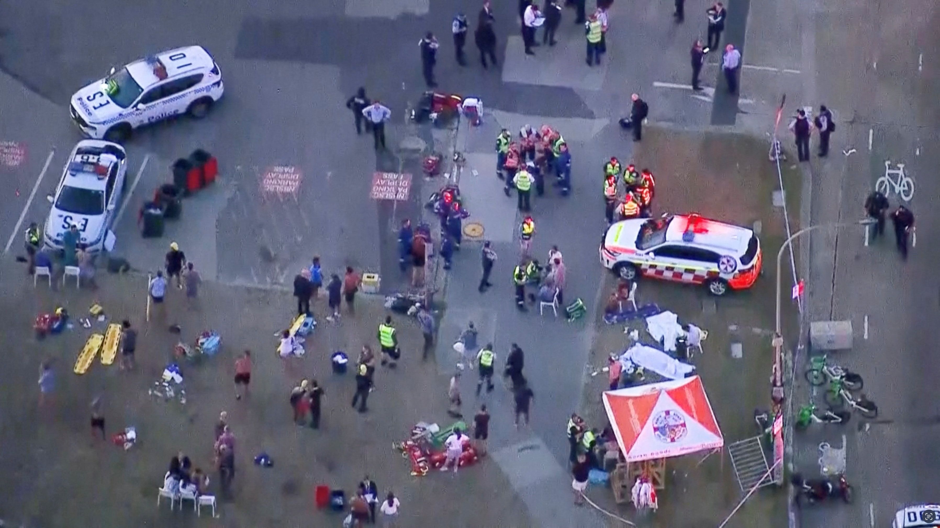 An aerial view of emergency personnel working at the scene of a shooting incident at Bondi Beach in Sydney, Australia, December 14, 2025, in this screen grab from a video. 