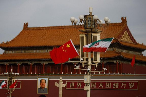 Iranian and Chinese flags in front of Beijing’s Palace Museum (file photo)